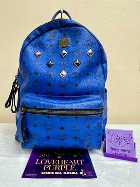 MCM Stark Blue Logo Studded Leather Backpack